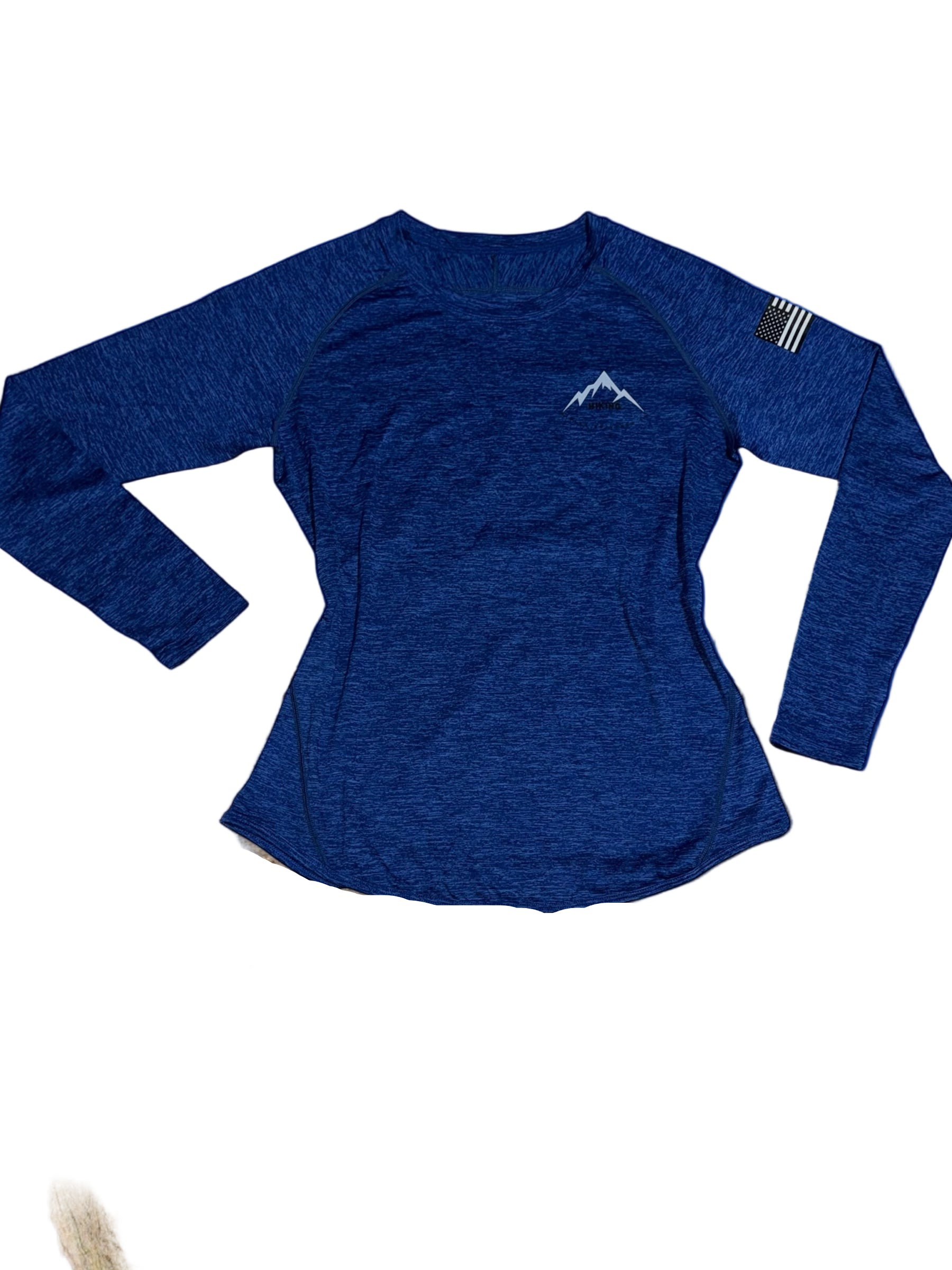 Blue long-sleeve shirt with a mountain logo on a rock with mountain background