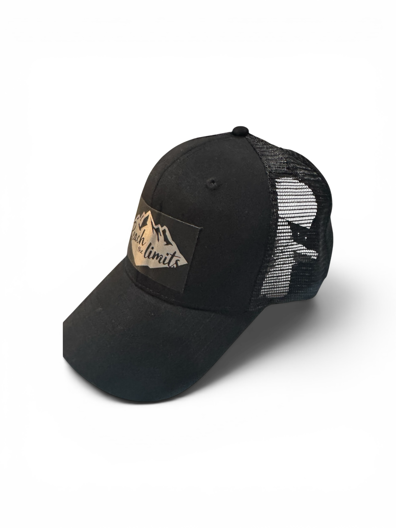 HIKING UNIVERSE CO. black trucker hat with mesh back and metallic silver mountain graphic saying "Reach the limits".