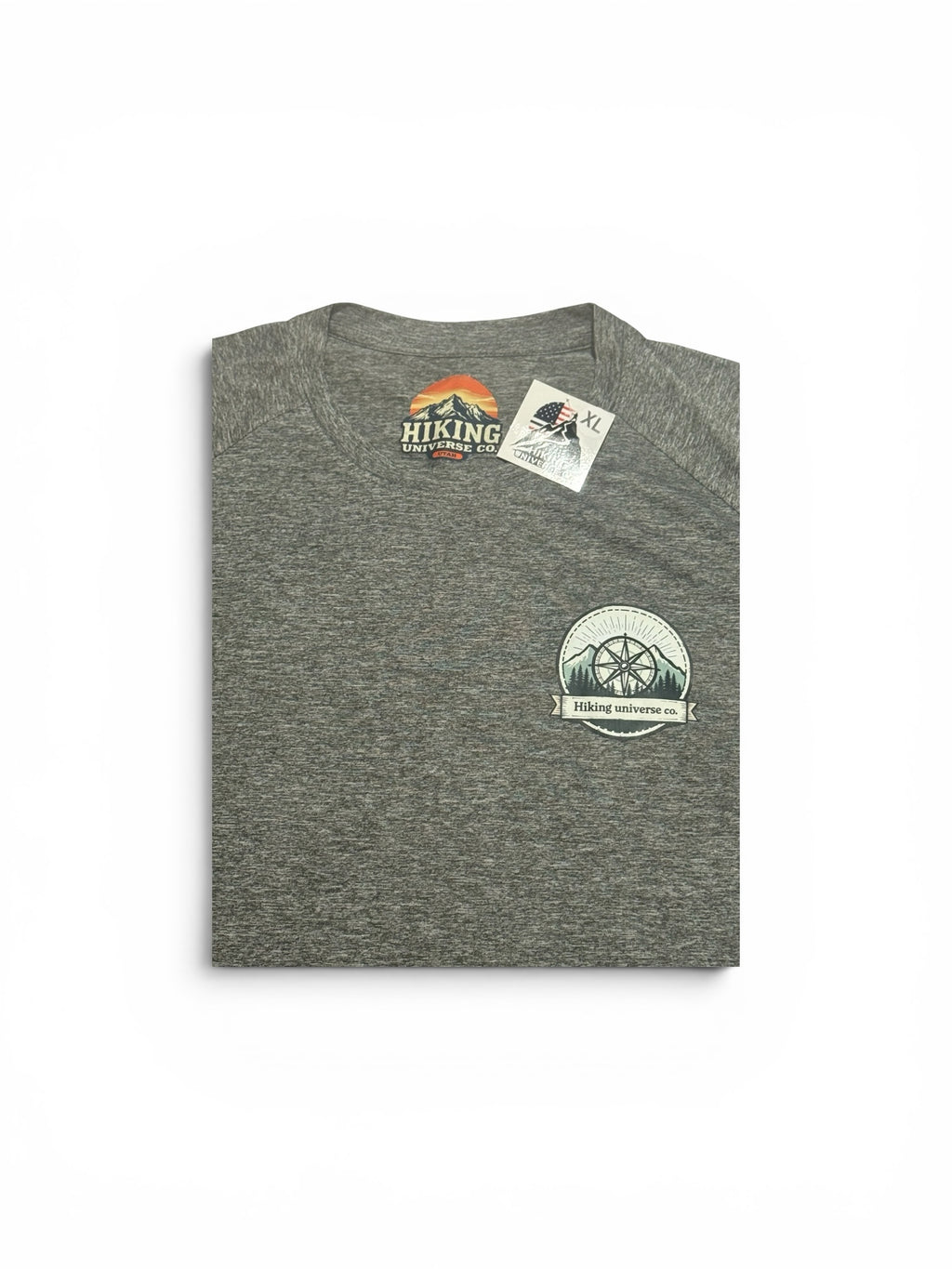 HIKING UNIVERSE CO. heather grey performance crewneck t-shirt with a compass chest logo and raglan sleeves.
