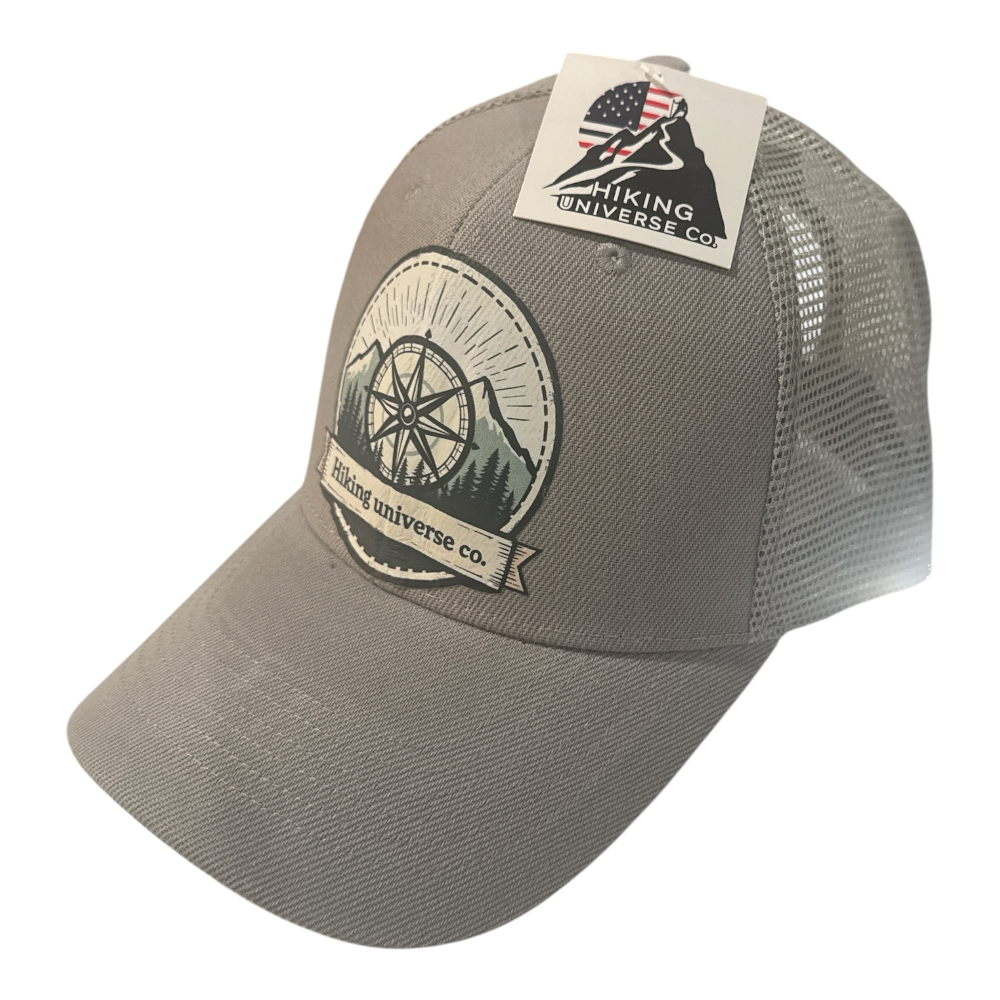 HIKING UNIVERSE CO. taupe cotton blend trucker hat with embroidered compass and mountain patch.